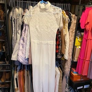Beautiful white jumpsuit.  New without tags.